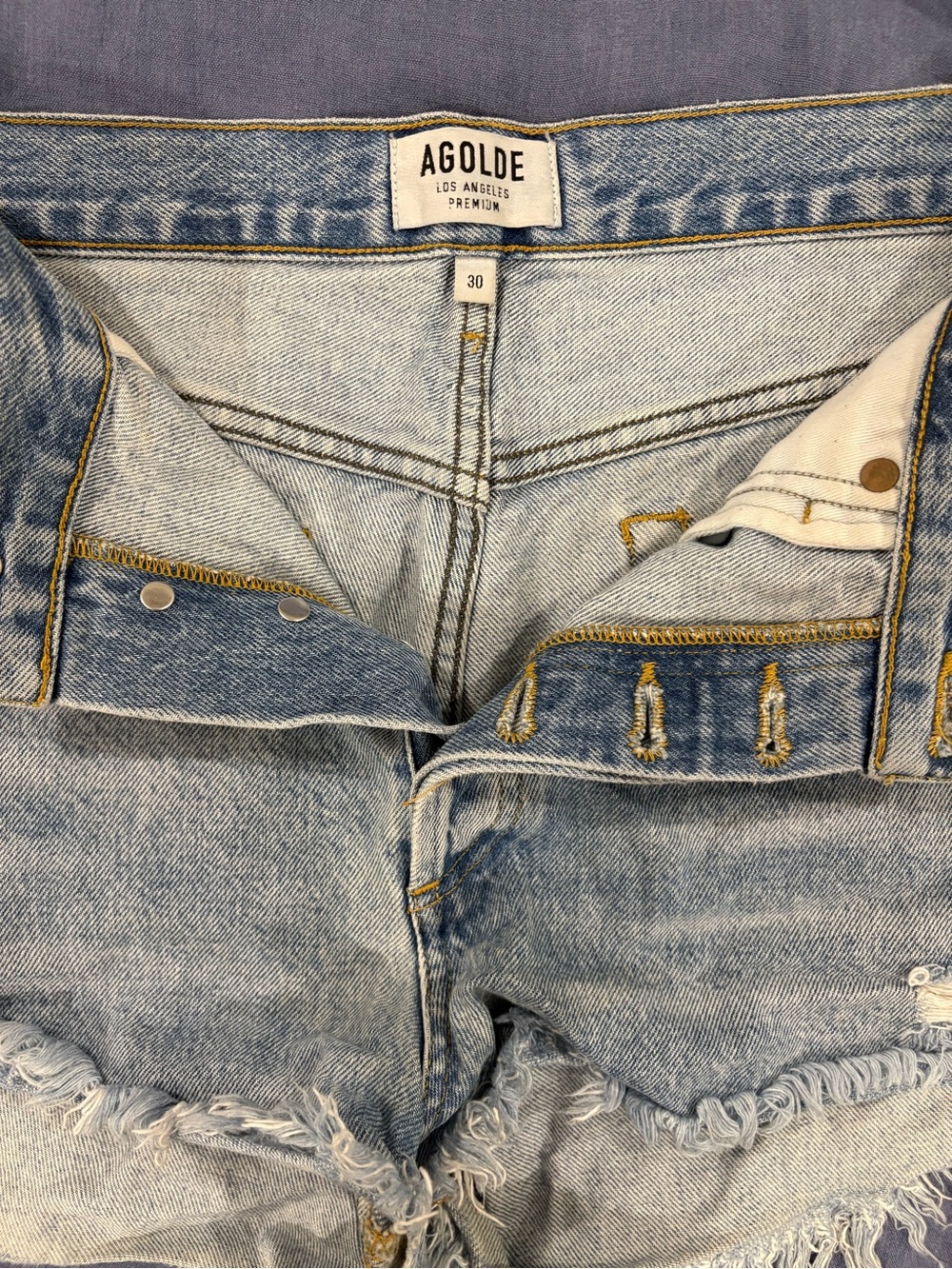 Agolde Light Blue Distressed Denim Cutoff Shorts - Picture 5 of 6